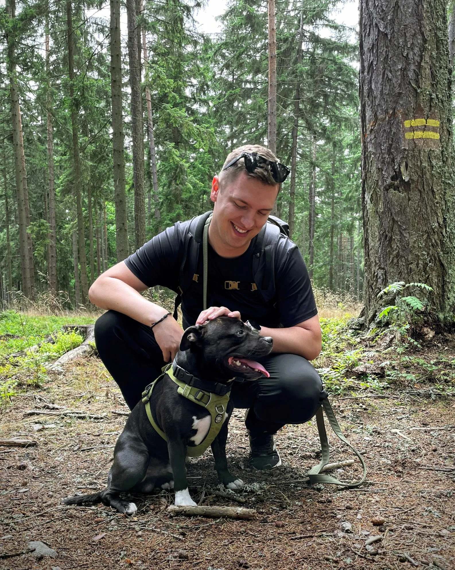 Martin with his dog Charlie in the forest